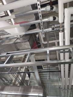 Ductwork and ceiling infrastructure progress.