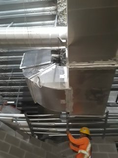 Overhead utilities coordinated before finish work.
